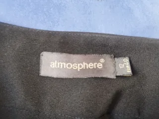 Falda negra con cinturón hebilla