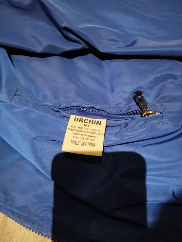 Chaqueta azul con capucha para chico