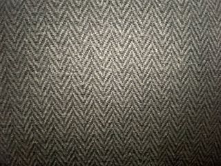 Sillón tapizado tela