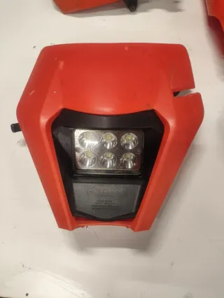 Foco led, tapa embrague, paramanos, filtro aire.