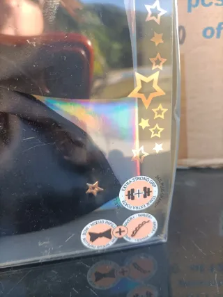 Lazo clip negro con estrellas doradas