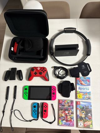 Nintendo Switch + 4 mandos + 3 juegos (ring fit)