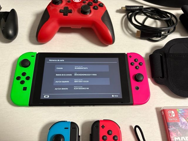 Nintendo Switch + 4 mandos + 3 juegos (ring fit)