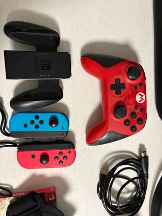 Nintendo Switch + 4 mandos + 3 juegos (ring fit)