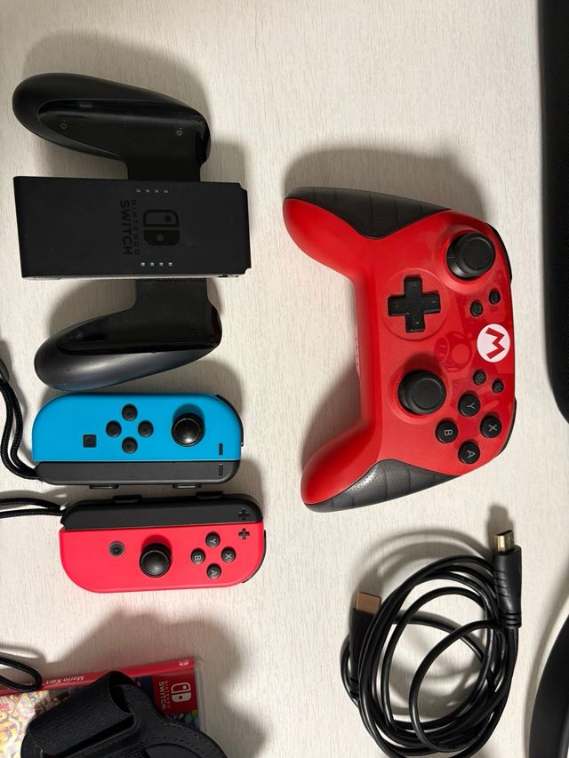 Nintendo Switch + 4 mandos + 3 juegos (ring fit)