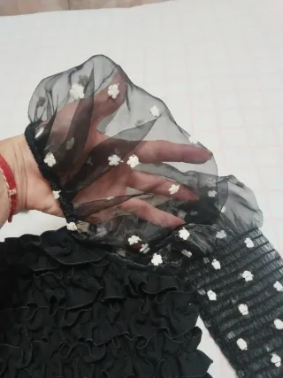 Chalecos de fiesta lentejuelas y volantes