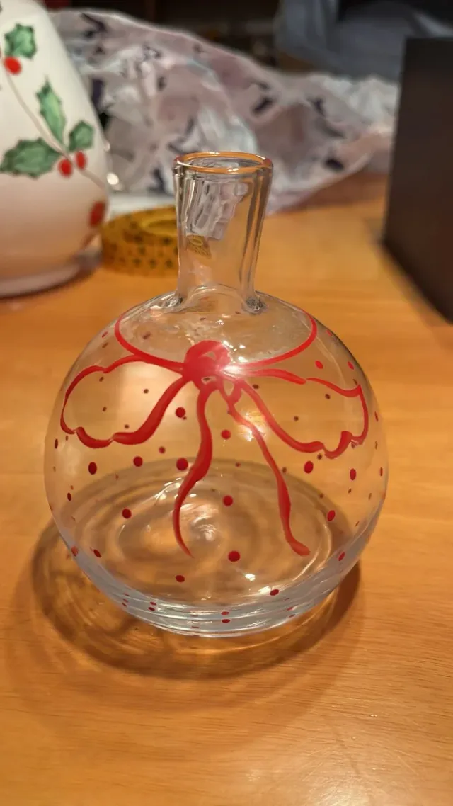 Ampolla in vetro con fiocco rosso