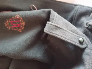 Trenca con capucha verde