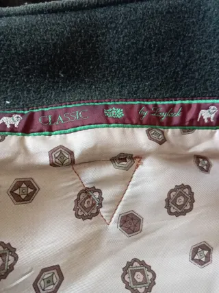 Trenca con capucha verde