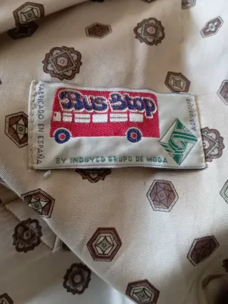 Trenca con capucha verde