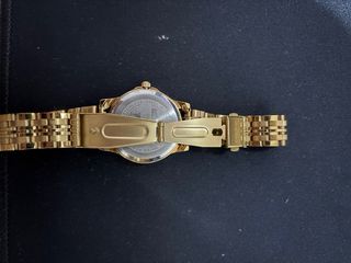 Reloj Exactime Dorado Acero