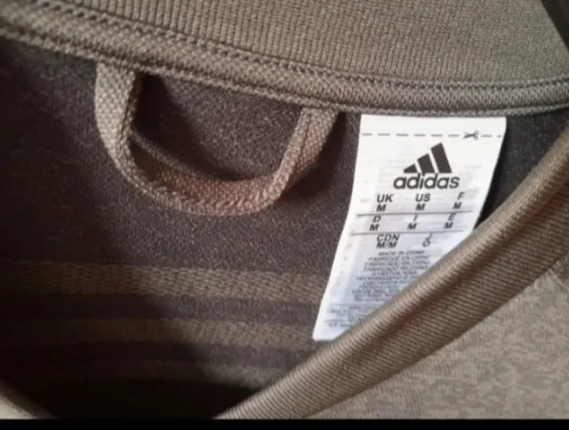 Chaqueta deportiva Adidas gris