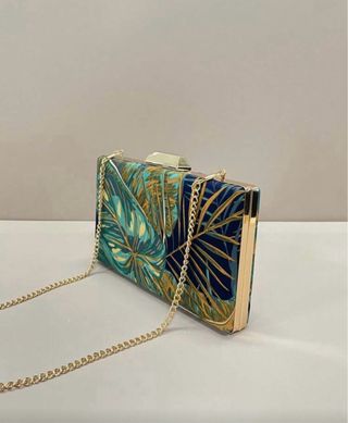 Bolso de mano estampado tropical