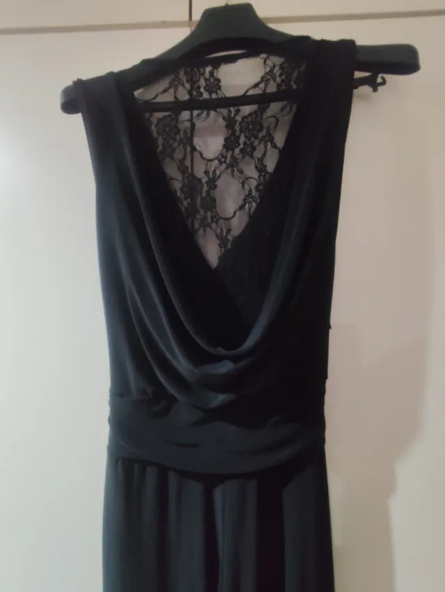 Mono negro elegante con encaje espalda L
