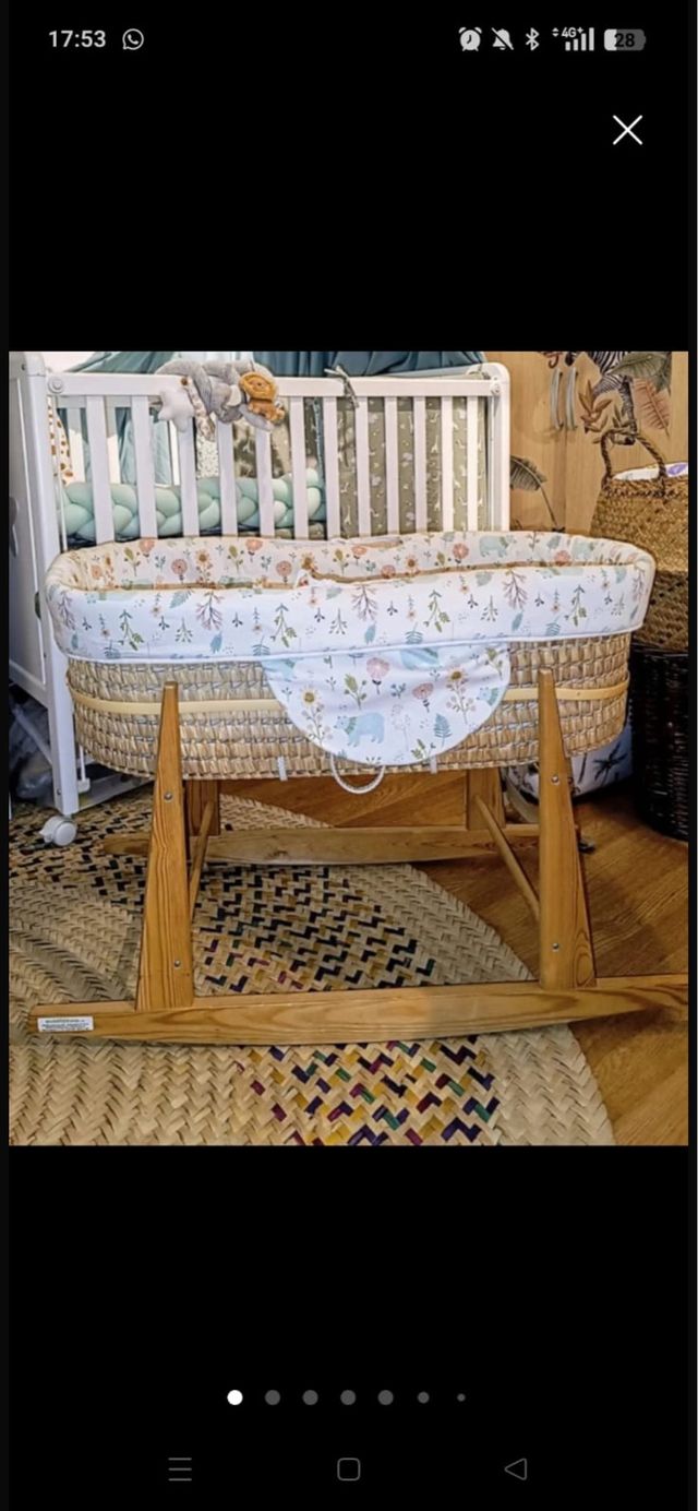 Minicuna de madera casi sin uso