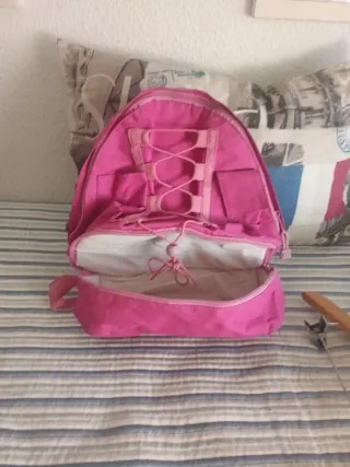 Mochila pequeña rosa con cordones