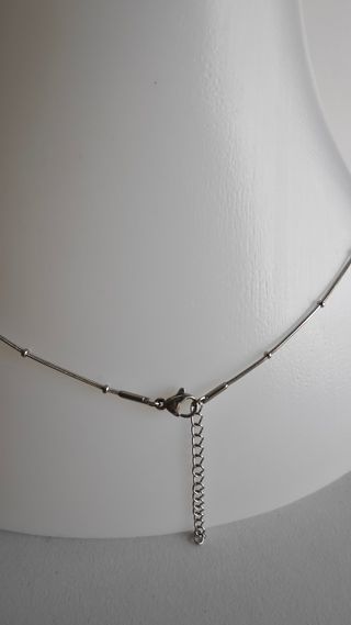 Collar de acero con monedas plateado nuevo