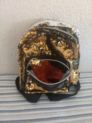 Mochila lentejuelas doradas y plateadas