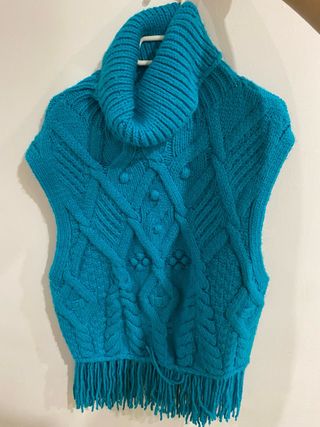 Chaleco de punto cuello alto azul brillante