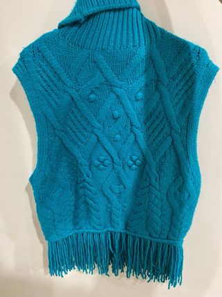 Chaleco de punto cuello alto azul brillante