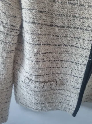 Chaqueta torera beige y negra