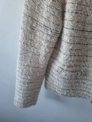 Chaqueta torera beige y negra