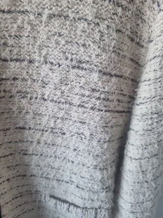 Chaqueta torera beige y negra