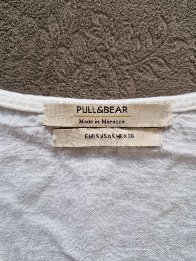 Blusa crop top blanca cuello V