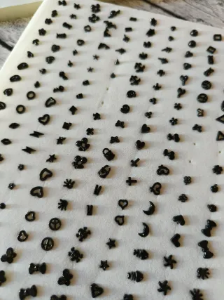 Pendientes infantiles variados,precio x expositor.