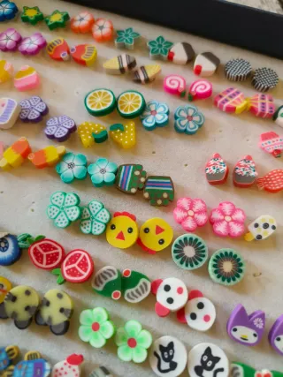 Pendientes infantiles variados,precio x expositor.