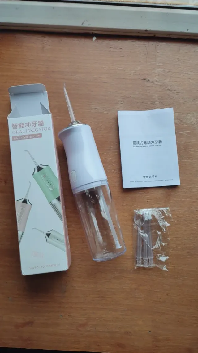 Irrigador bucal eléctrico inteligente