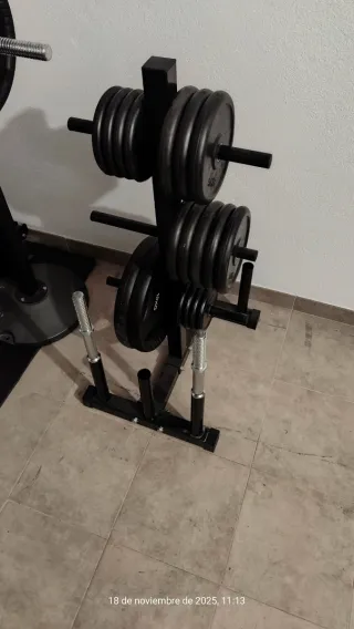 Set di manubri e dischi per palestra con supporto