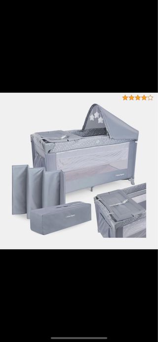 Cuna de viaje gris con estrellas