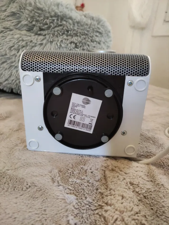 Calefactor cerámico móvil gris y blanco