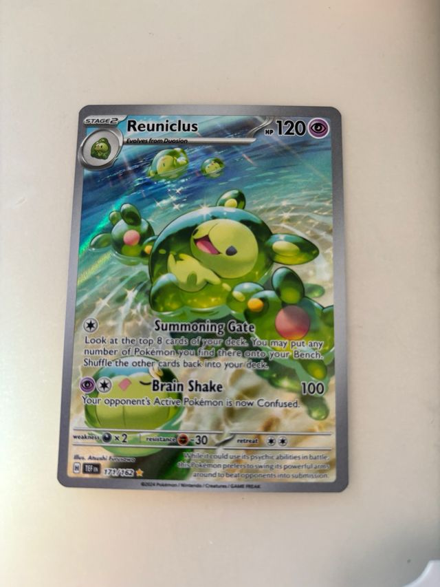 Carta Pokémon Reuniclus