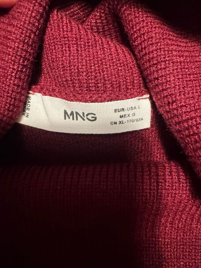 Jersey cuello alto con bolsillos