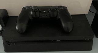 PS4 Slim 1TB + Controller + Giochi + Auricolari