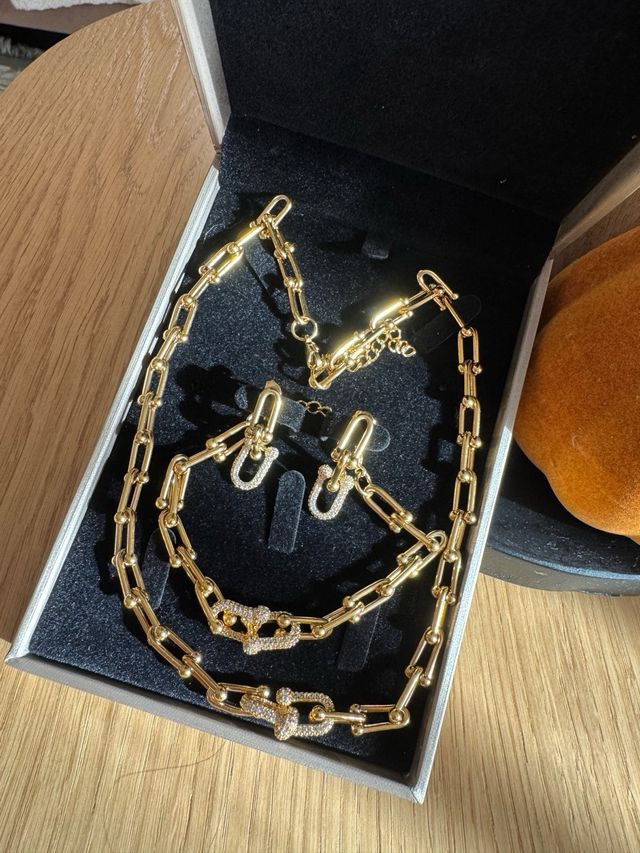 Conjunto bisutería eslabones dorados