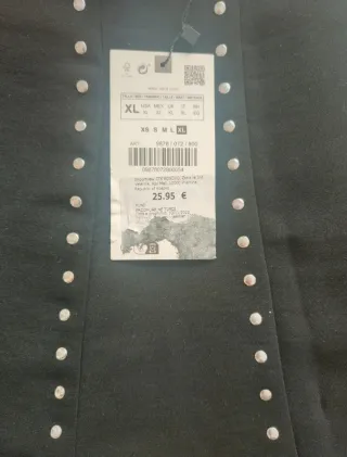 Falda Zara mini tachas