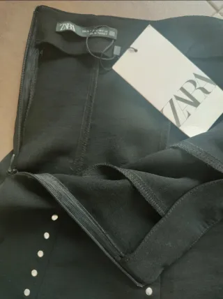 Falda Zara mini tachas