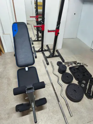 Banco de pesas, soporte y discos