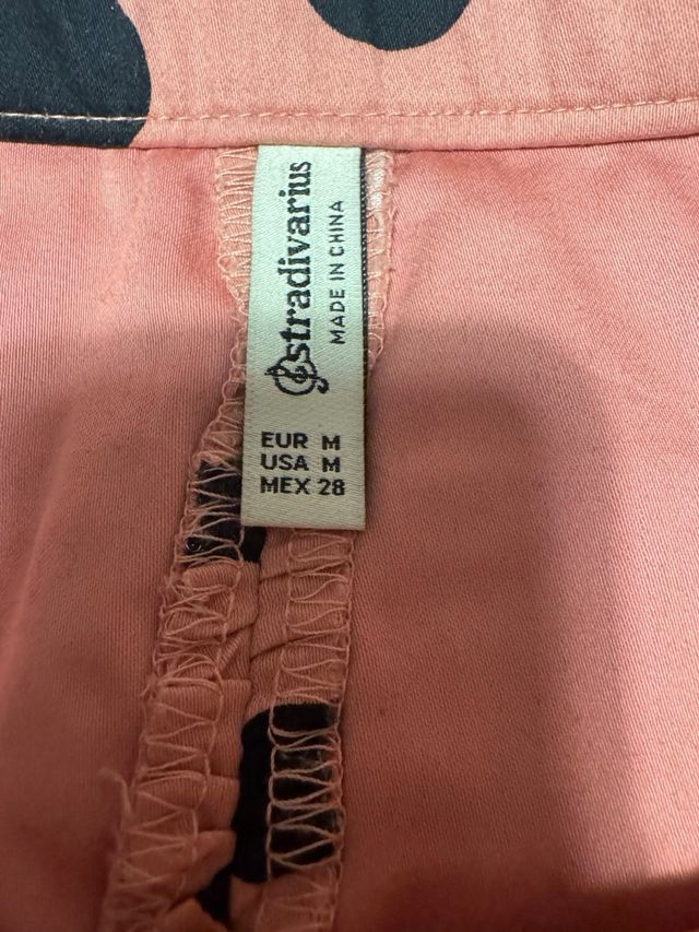 Falda mini lunares rosa y negra