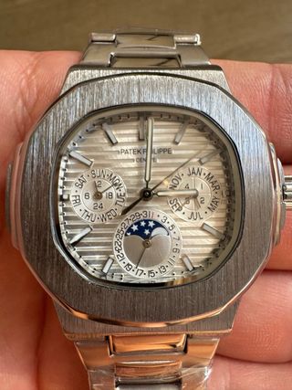 Reloj Patek Philippe de acero plateado y blanco