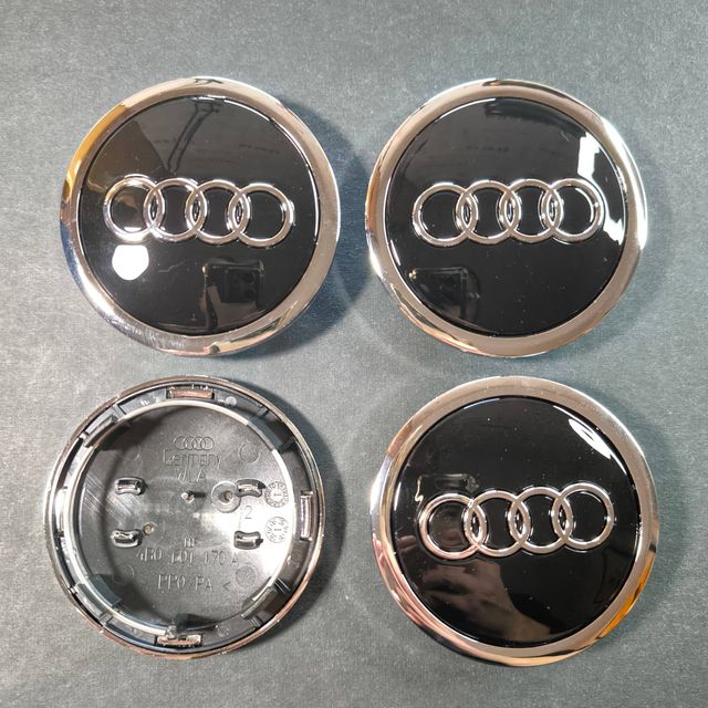 TAPABUJES AUDI 69mm NEGRO - EMBLEMA LLANTAS AUDI