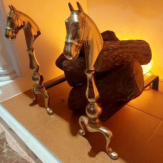 Soporte leña chimenea cabezas caballo