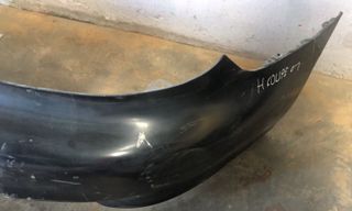 PARAGOLPES TRASERO HYUNDAI COUPE 1999 NEGRO