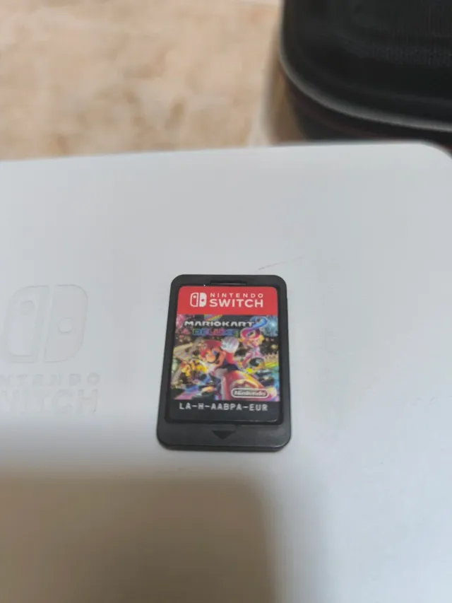 Nintendo Switch OLED + Mario Kart + 6 Joycons