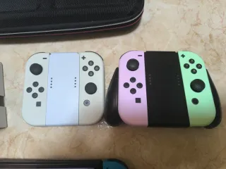 Nintendo Switch OLED + Mario Kart + 6 Joycons