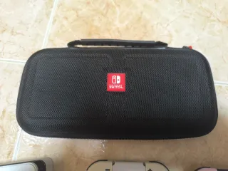 Nintendo Switch OLED + Mario Kart + 6 Joycons