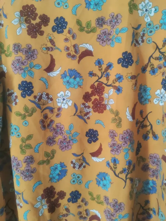 Blusa floral manga acampanada